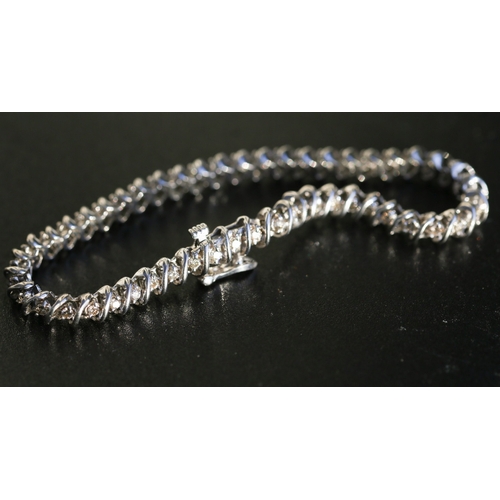 37 - Diamond Fifty Stone Set S Link Bracelet Mounted in 14 Carat White Gold 18.5cm Long