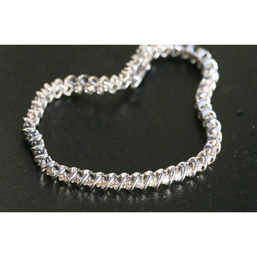 37 - Diamond Fifty Stone Set S Link Bracelet Mounted in 14 Carat White Gold 18.5cm Long