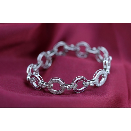 61 - Attractively Detailed Diamond and Ruby Set Circular Fancy Link Bracelet Mounted in Platinum Total Di... 