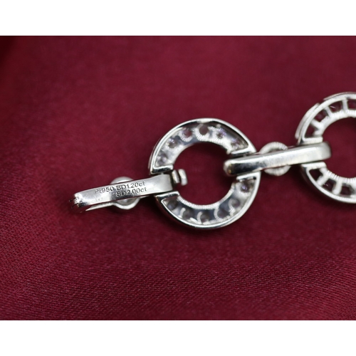 61 - Attractively Detailed Diamond and Ruby Set Circular Fancy Link Bracelet Mounted in Platinum Total Di... 