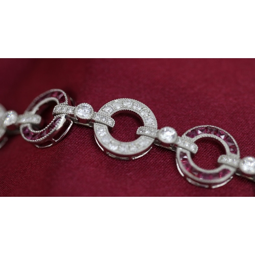 61 - Attractively Detailed Diamond and Ruby Set Circular Fancy Link Bracelet Mounted in Platinum Total Di... 