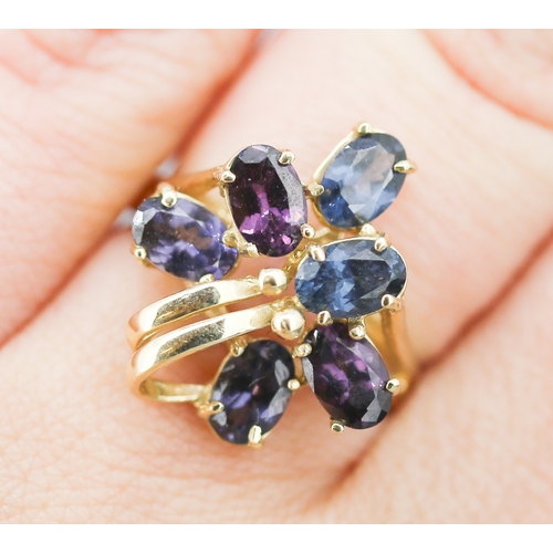 68 - Finely Detailed Iolite Set Floral Spray Cluster Ring Mounted in 9 Carat Yellow Gold Ring Size N