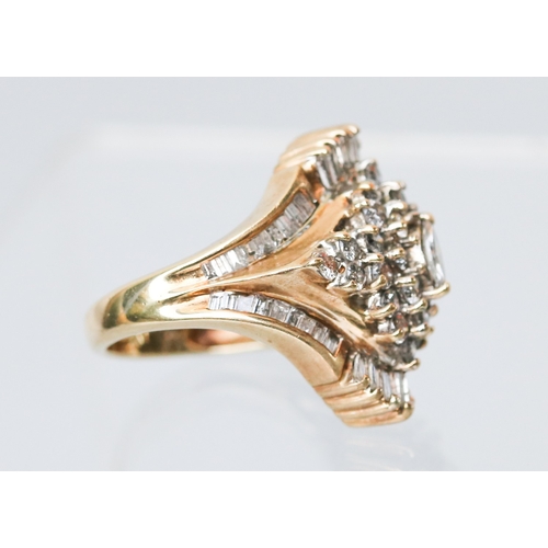 7 - Finely Detailed Marquise Cut Round Cut and Tapered Baguette Cut Diamond Set Cluster Ring Mounted in ... 
