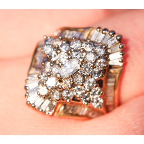 7 - Finely Detailed Marquise Cut Round Cut and Tapered Baguette Cut Diamond Set Cluster Ring Mounted in ... 