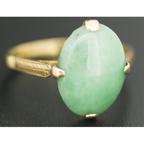 73 - Jade Single Stone Set Ring Mounted in 18 Carat Yellow Gold Ring Size M