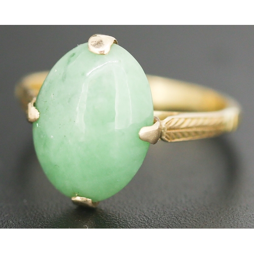 73 - Jade Single Stone Set Ring Mounted in 18 Carat Yellow Gold Ring Size M