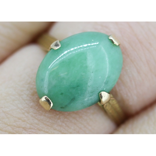 73 - Jade Single Stone Set Ring Mounted in 18 Carat Yellow Gold Ring Size M