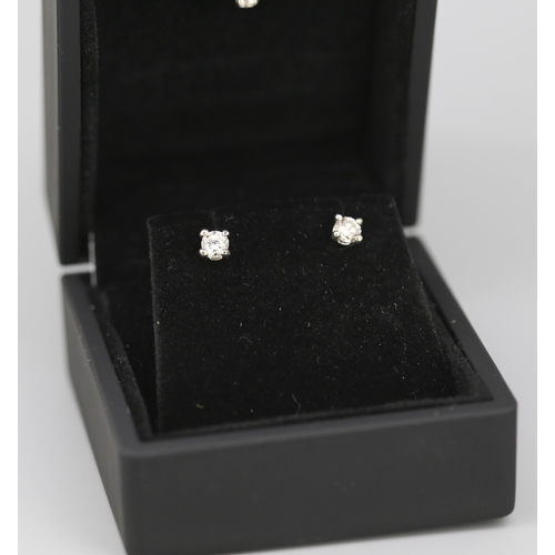 76 - Pair of Diamond Solitaire Earrings Mounted in 9 Carat White Gold Total Diamond Carat Weight Approxim... 