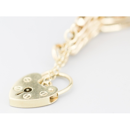 78 - Attractively Detailed Red Garnet Bezel Set Seven Stone Gate Link Bracelet Mounted in 9 Carat Yellow ... 