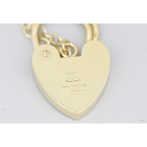 78 - Attractively Detailed Red Garnet Bezel Set Seven Stone Gate Link Bracelet Mounted in 9 Carat Yellow ... 