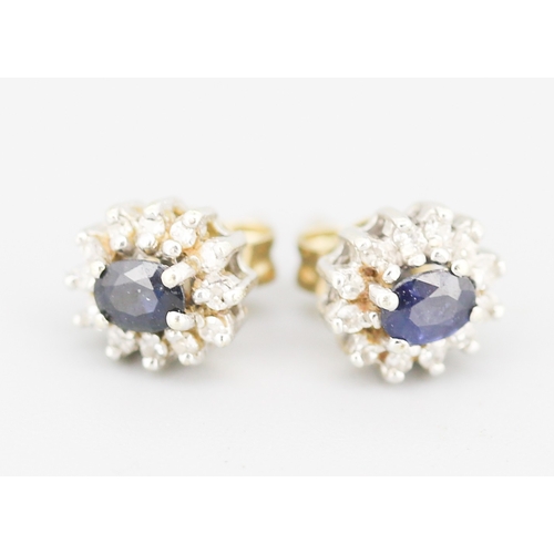 84 - Pair of Sapphire Set Earrings with Diamond Set Halo Mounted in 9 Carat Yellow Gold 8mm High