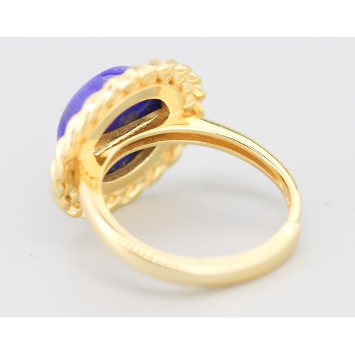 86 - Attractively Detailed Lapis Lazuli Set Single Stone Ring Mounted in Silver Gilt Ring Size O and Adju... 