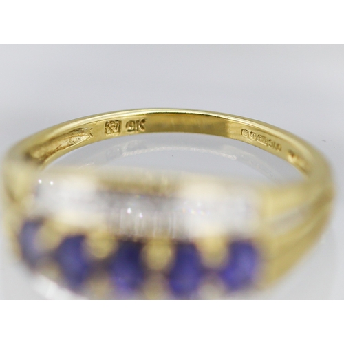 1 - Tanzanite Five Stone Set Ring with Further Diamond Inset to Sides Mounted in 9 Carat Yellow Gold Rin... 