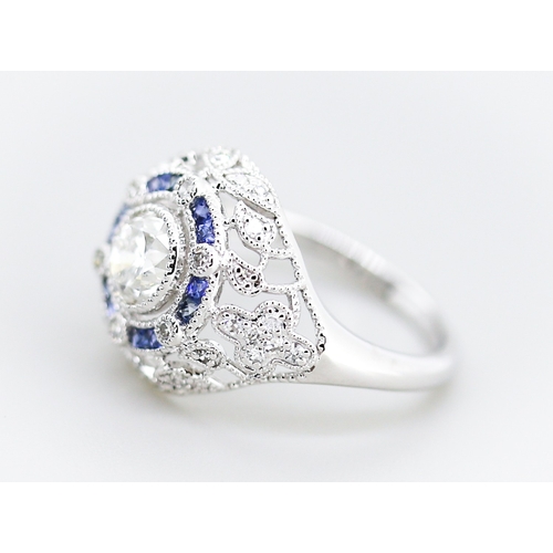 11 - Finely Detailed Diamond Centre Stone Ring with Sapphire and Diamond Set Cluster Surround Floral Moti... 