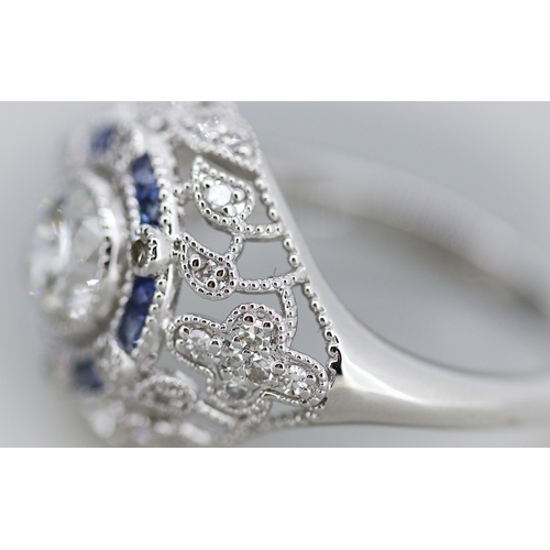 11 - Finely Detailed Diamond Centre Stone Ring with Sapphire and Diamond Set Cluster Surround Floral Moti... 
