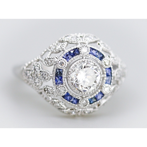 11 - Finely Detailed Diamond Centre Stone Ring with Sapphire and Diamond Set Cluster Surround Floral Moti... 