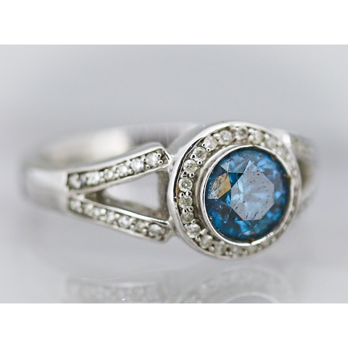 14 - Blue Diamond Solitaire with Diamond Halo Surround and Further Diamond Inset to Shoulders Mounted in ... 
