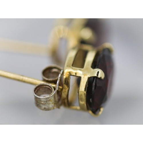 17 - Pair of Red Garnet Set Single Stone Earrings Mounted in 9 Carat Yellow Gold 1cm