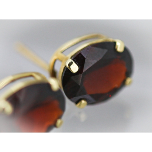 17 - Pair of Red Garnet Set Single Stone Earrings Mounted in 9 Carat Yellow Gold 1cm