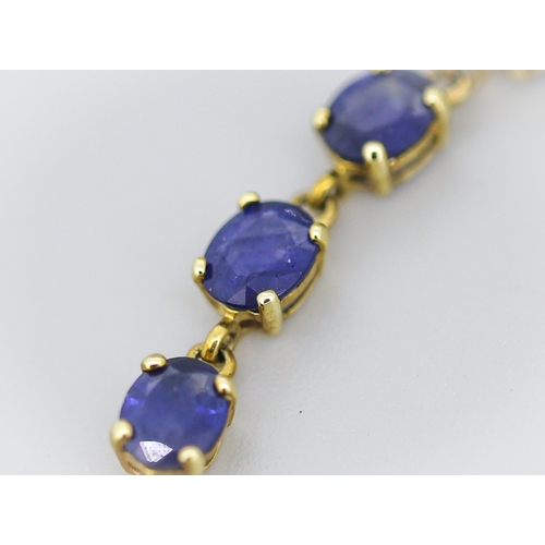 2 - Sapphire Twenty-Two Stone Set Tennis Bracelet Mounted in 9 Carat Yellow Gold 19cm Long