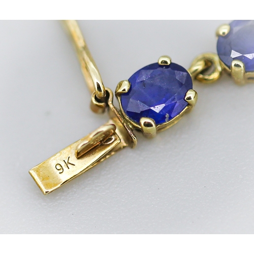 2 - Sapphire Twenty-Two Stone Set Tennis Bracelet Mounted in 9 Carat Yellow Gold 19cm Long