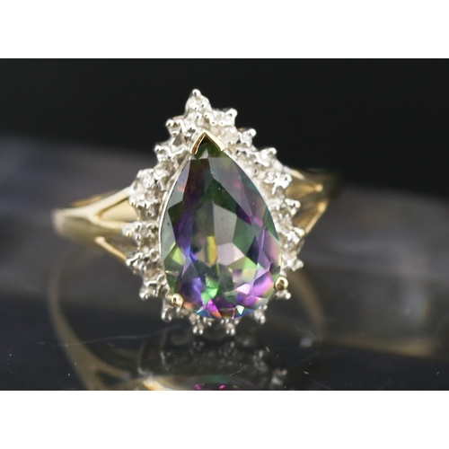 Pear Cut Mystic Topaz Set Ring with Further Diamond Inset Mounted in 9 Carat Yellow Gold Ring Size P
