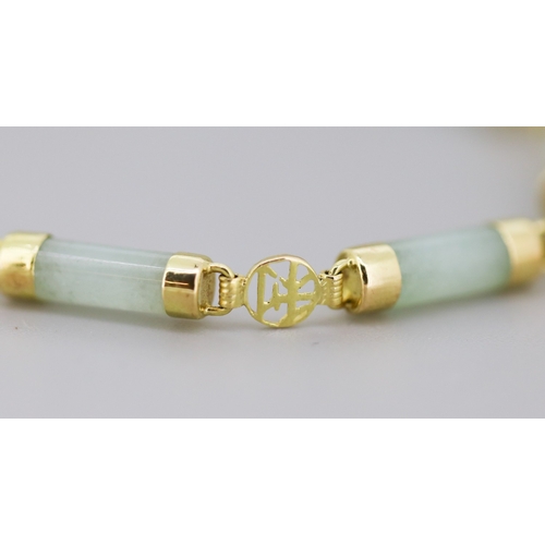22 - Attractively Detailed Jade Bar Set Bracelet with Further Carnelian Insets Mounted in 14 Carat Yellow... 