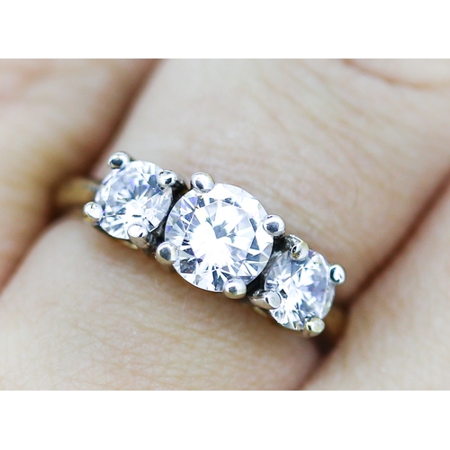 25 - Three Stone Arctic Sapphire Ring Mounted in 9 Carat Yellow Gold Ring Size O