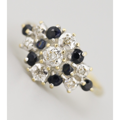 Finely Detailed Sapphire and Diamond Set Cluster Ring Mounted in 9 Carat Yellow Gold Ring Size O