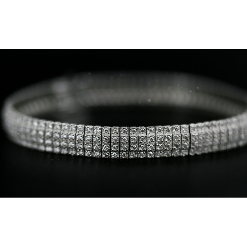 28 - Finely Detailed Diamond Four Row Cluster Set Bracelet Mounted in 18 Carat White Gold Total Diamond C... 