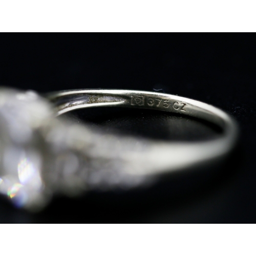 29 - Attractively Detailed Baguette Cut Cubic Zirconia Set Ring with Further Gemstones Set to Shoulders M... 