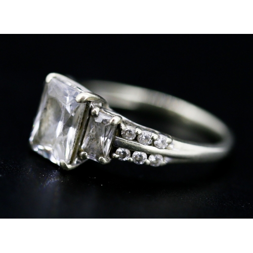 29 - Attractively Detailed Baguette Cut Cubic Zirconia Set Ring with Further Gemstones Set to Shoulders M... 