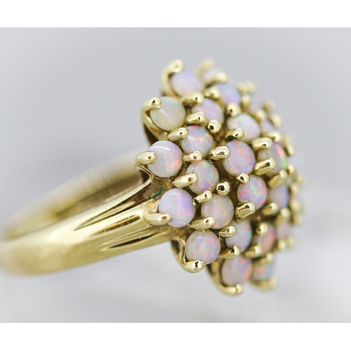 3 - Attractively Detailed Opal Cluster Set Ring Mounted in 9 Carat Yellow Gold Ring Size K