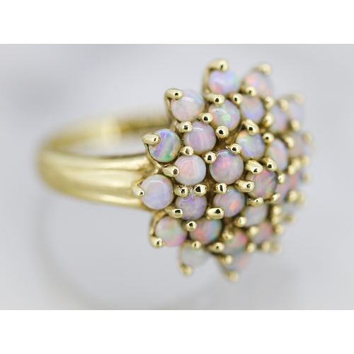3 - Attractively Detailed Opal Cluster Set Ring Mounted in 9 Carat Yellow Gold Ring Size K