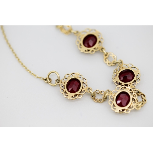 31 - Finely Detailed Cherry Garnet Seven Stone Set Bracelet Mounted in 9 Carat Yellow Gold with Safety Ch... 