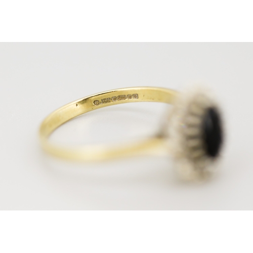 32 - Sapphire Set Ring with Diamond Set Halo Surround Mounted in 9 Carat Yellow Gold Ring Size O and a Ha... 