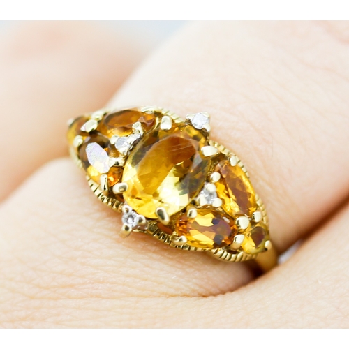 33 - Finely Detailed Citrine Cluster Set Ring with Further Diamond Insets Mounted in 9 Carat Yellow Gold ... 