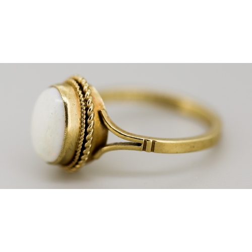 35 - Opal Bezel Set Single Stone Ring Mounted in 9 Carat Yellow Gold Ring Size N