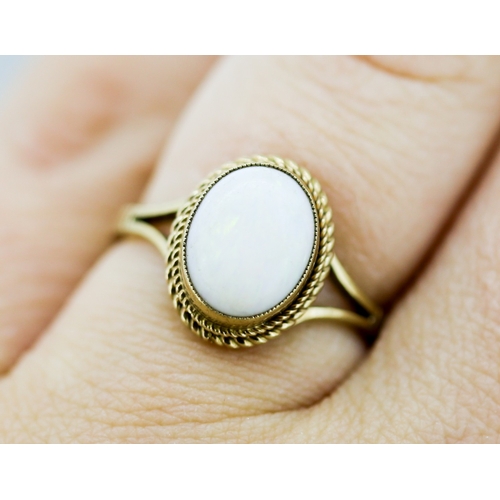 35 - Opal Bezel Set Single Stone Ring Mounted in 9 Carat Yellow Gold Ring Size N