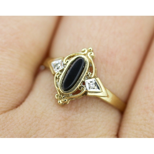 38 - Attractively Detailed Onyx Set Ring with Further Diamond Inset Mounted in 9 Carat Yellow Gold Ring S... 