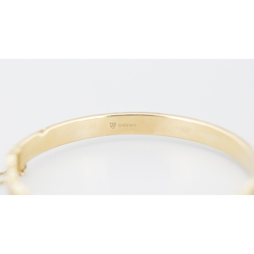 41 - Attractively Detailed Sapphire Set Bangle Bracelet Mounted in 9 Carat Yellow Gold Inner Width 6cm
