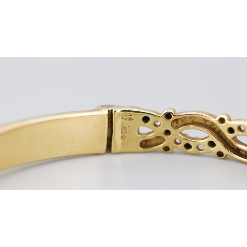 41 - Attractively Detailed Sapphire Set Bangle Bracelet Mounted in 9 Carat Yellow Gold Inner Width 6cm
