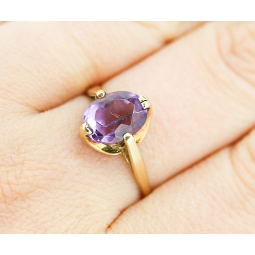 48 - Attractively Detailed Amethyst Set Single Stone Ring Mounted in 9 Carat Yellow Gold Ring Size U