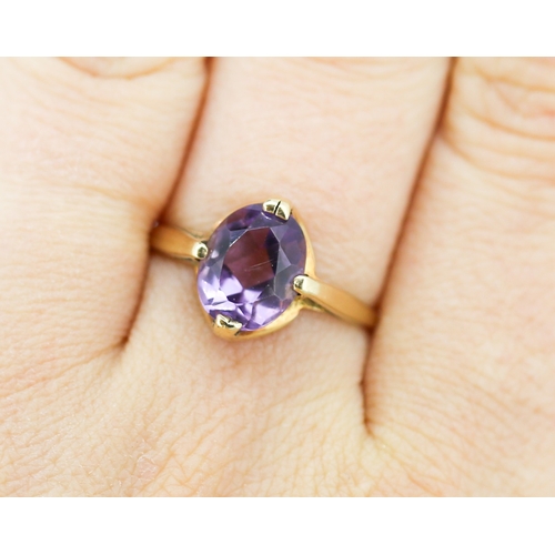 48 - Attractively Detailed Amethyst Set Single Stone Ring Mounted in 9 Carat Yellow Gold Ring Size U