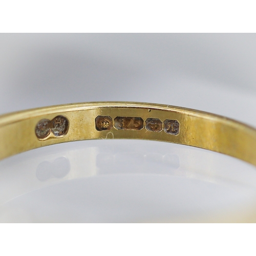 5 - Ruby and Cubic Zirconia Set Seven Stone Set Ring Mounted in 9 Carat Yellow Gold Ring Size Q