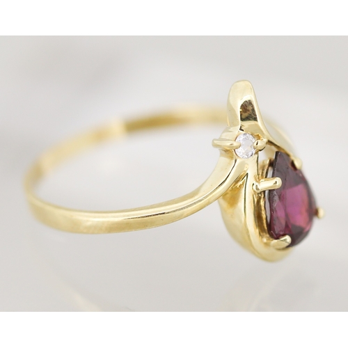 50 - Finely Detailed Pear Cut Garnet Set Ring Mounted in 9 Carat Yellow Gold Ring Size S
