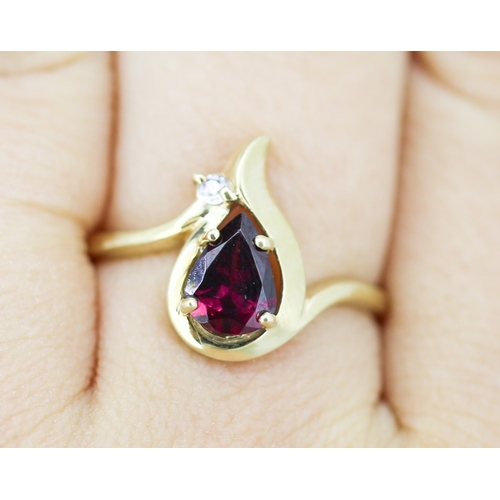 50 - Finely Detailed Pear Cut Garnet Set Ring Mounted in 9 Carat Yellow Gold Ring Size S