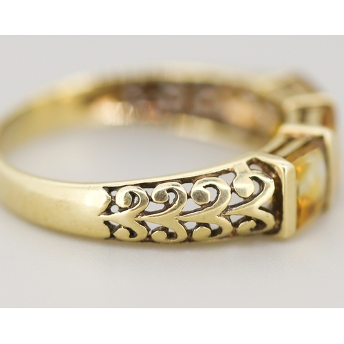 51 - Citrine Princess Cut Three Stone Ring with Filigree Motifs to Shoulders Mounted in 9 Carat Yellow Go... 