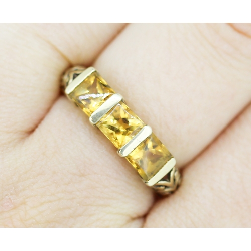 51 - Citrine Princess Cut Three Stone Ring with Filigree Motifs to Shoulders Mounted in 9 Carat Yellow Go... 