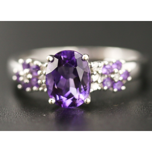 52 - Finely Detailed Amethyst Set Cluster Ring with Further Diamond Insets Mounted in 9 Carat White Gold ... 